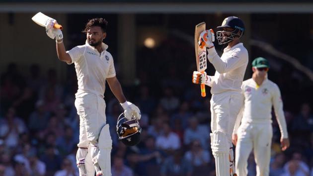 India's Rishabh Pant (L) celebrates scoring his 150 runs with his teammate Ravindra Jadeja on day two of the fourth test match between Australia and India at the SCG in Sydney, Australia, January 4, 2019(REUTERS)