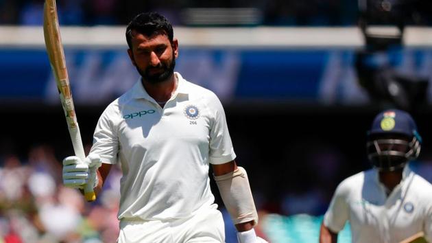 India's Cheteshwar Pujara (L) reacts as he walks off the ground after being dismissed, as teammate Rishabh Pant (R) looks on during the second day of the fourth and final cricket Test between India and Australia at the Sydney Cricket Ground.(AFP) India's Cheteshwar Pujara (L) reacts as he walks off the ground after being dismissed, as teammate Rishabh Pant (R) looks on during the second day of the fourth and final cricket Test between India and Australia at the Sydney Cricket Ground.(AFP)