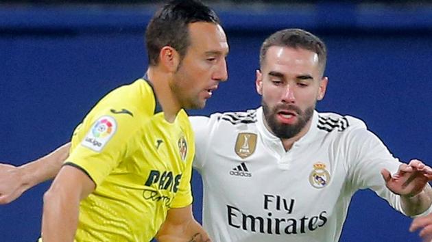 Villarreal's Santi Cazorla in action with Real Madrid's Dani Carvajal. (REUTERS) Villarreal's Santi Cazorla in action with Real Madrid's Dani Carvajal. (REUTERS)