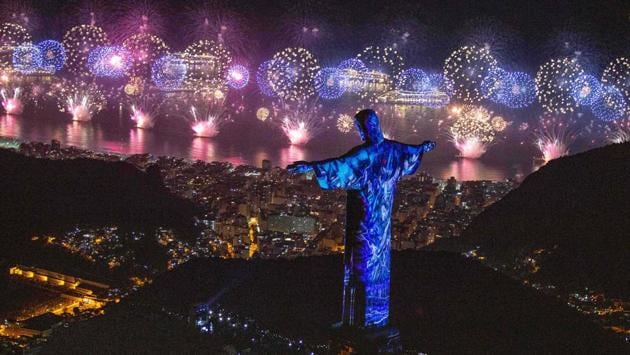 A view of Christ the Redeemer above Rio De Janeiro during the New Year’s fireworks celebration in Brazil. (Fernando Maia / Riotur / AFP) A view of Christ the Redeemer above Rio De Janeiro during the New Year’s fireworks celebration in Brazil. (Fernando Maia / Riotur / AFP)
