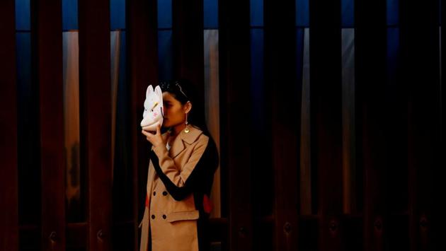 A woman holds a traditional fox mask to have her photo taken at Meiji Shrine in Tokyo, Japan. (Kim Kyung-Hoon / REUTERS) A woman holds a traditional fox mask to have her photo taken at Meiji Shrine in Tokyo, Japan. (Kim Kyung-Hoon / REUTERS)
