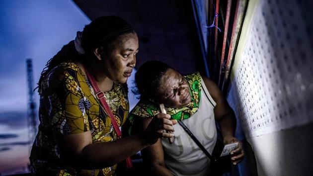 Late voters check the voting list in a school in Kinshasa, during Democratic Republic of Congo’s general elections. After two years of delays, crackdowns and political turmoil, the country voted on December 30 in presidential elections that will determine the future of Africa’s notoriously unstable giant. (Luis Tato / AFP) Late voters check the voting list in a school in Kinshasa, during Democratic Republic of Congo’s general elections. After two years of delays, crackdowns and political turmoil, the country voted on December 30 in presidential elections that will determine the future of Africa’s notoriously unstable giant. (Luis Tato / AFP)