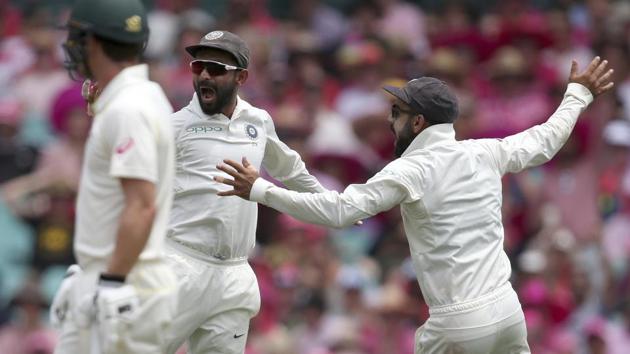 India's Ajinkya Rahane, center, celebrates with Kohli, right, catching out Australia's Marnus Labuschagne for 38 runs on day 3 of their cricket test match in Sydney, Saturday, Jan. 5, 2019(AP) India's Ajinkya Rahane, center, celebrates with Kohli, right, catching out Australia's Marnus Labuschagne for 38 runs on day 3 of their cricket test match in Sydney, Saturday, Jan. 5, 2019(AP)