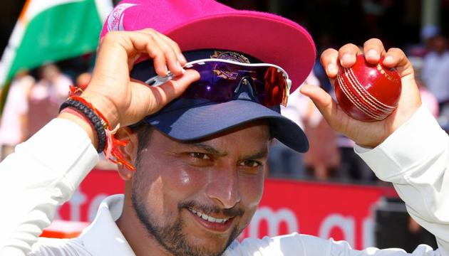 India's Kuldeep Yadav wears a pink cap atop his hat before the start of the third day's play of the fourth and final cricket Test between India and Australia at the Sydney Cricket Ground on January 5, 2019 (AFP) India's Kuldeep Yadav wears a pink cap atop his hat before the start of the third day's play of the fourth and final cricket Test between India and Australia at the Sydney Cricket Ground on January 5, 2019 (AFP)