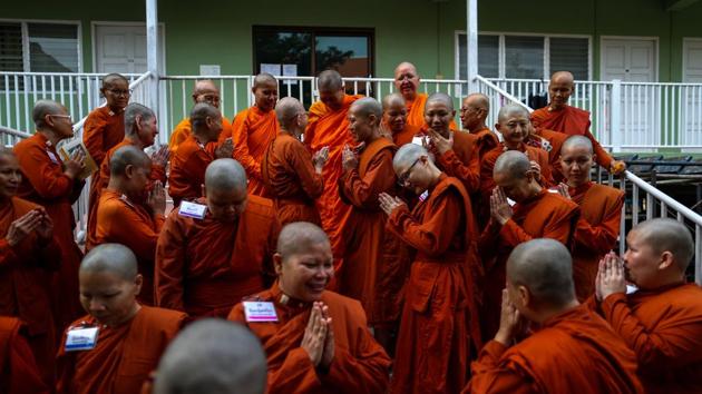 Novice monks gather during a group photo session at the Songdhammakalyani monastery. “Women can’t be ordained here, but no one stops them from doing that overseas. They just can’t be ordained by Thai monks, that’s all,” said Narong Songarom, spokesman of the National Office of Buddhism. (Athit Perawongmetha / REUTERS) Novice monks gather during a group photo session at the Songdhammakalyani monastery. “Women can’t be ordained here, but no one stops them from doing that overseas. They just can’t be ordained by Thai monks, that’s all,” said Narong Songarom, spokesman of the National Office of Buddhism. (Athit Perawongmetha / REUTERS)