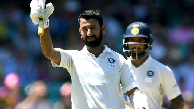 Cheteshwar Pujara celebrates after scoring his 150 runs. (REUTERS)