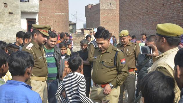 A 16-year-old boy was allegedly set on fire by three local men near Tulsi Niketan locality in Sahibabad on Saturday morning. The police reached the spot and enquired about incident from locals and victim's family members in Ghaziabad(Sakib Ali/ HT Photo) A 16-year-old boy was allegedly set on fire by three local men near Tulsi Niketan locality in Sahibabad on Saturday morning. The police reached the spot and enquired about incident from locals and victim's family members in Ghaziabad(Sakib Ali/ HT Photo)