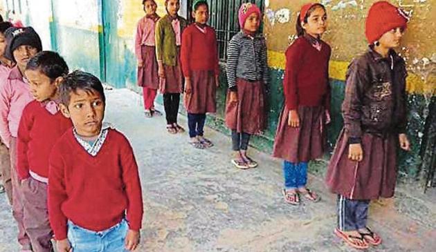 Students without shoes at primary school in Nagla Rambal in Agra.(Sourced)