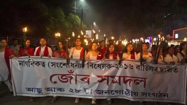 Activists of All Assam Students Union and various ethnic groups participate in a torch light procession to protest against Citizenship (Amendment) Bill 2016 in Gauhati on November 16(AP File Photo)