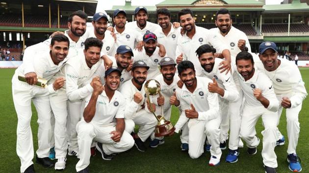 India celebrate with the trophy after winning the Test series against Australia.(Twitter/BCCI)