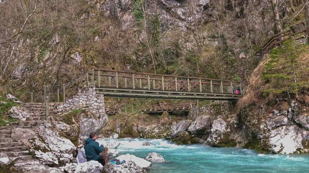 Tolmin gorge is enchanting with a boardwalk running along the clear blue water and little waterfalls.