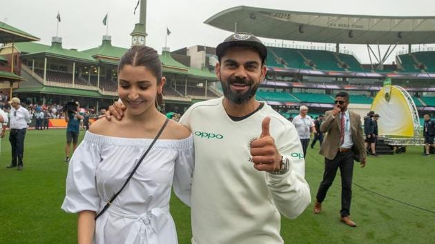 India's captain Virat Kohli celebrates with wife Anushka Sharma after winning the series 2-1 in Sydney.(REUTERS)