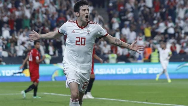 Iran's forward Sardar Azmoun celebrates after scoring his side's fourth goal during the AFC Asian Cup group D match against Yemen.(AP)