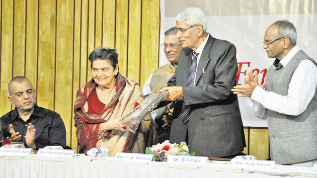 Sai Paranjape (second from left) was presented with the Fergusson Gaurav award by S F Patil (second from right), executive director, international affairs, research and training, Bharati Vidyapeeth deemed university, at the Navalmal Firodia Law College on Sunday.(HT Photo) Sai Paranjape (second from left) was presented with the Fergusson Gaurav award by S F Patil (second from right), executive director, international affairs, research and training, Bharati Vidyapeeth deemed university, at the Navalmal Firodia Law College on Sunday.(HT Photo)