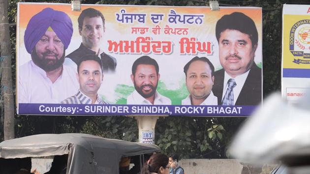 A poster with photos of Congress president Rahul Gandhi, Punjab CM Amarinder Singh and other party leaders in Amritsar. (AFP File) A poster with photos of Congress president Rahul Gandhi, Punjab CM Amarinder Singh and other party leaders in Amritsar. (AFP File)