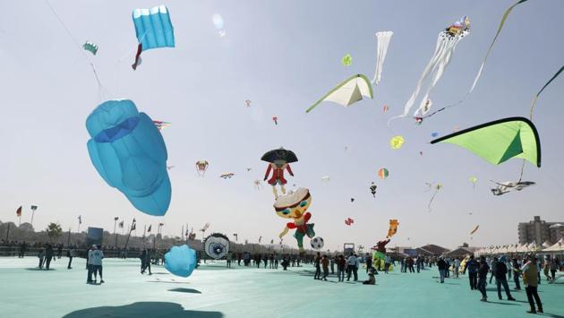 Colourful kites of various shapes and sizes head for the sky in Ahmedabad. In Gujarat, kites are popularly flown during the Hindu festival of Makar Sankranti which falls on January 14. (Siddharaj Solanki / HT Photo) 