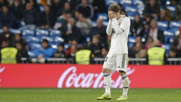 Real Madrid's Luka Modric reacts after their 2-0 loss to Real Sociedad on Sunday.(AP)