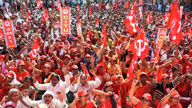 Activists under the banner of Centre of Indian Trade Unions (CITU) raise slogans during the 48-hours-long nationwide general strike called by central trade unions protesting against "anti-people" policies of the Center, in Nagpur, Tuesday, January 8, 2019.(PTI)