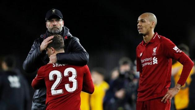 Liverpool manager Juergen Klopp, Xherdan Shaqiri and Fabinho react after the match against Wolves. (REUTERS) Liverpool manager Juergen Klopp, Xherdan Shaqiri and Fabinho react after the match against Wolves. (REUTERS)