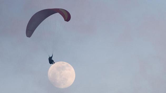 The sport also debuted the following month at the Asian Games where an Afghan athlete suffered a spinal injury and a Chinese competitor broke a leg in separate crash landings. Hong Kong has eight approved flying areas for paragliding. But pilots fear the sport’s growth might be limited by pressure to build on parkland in a city with a major housing shortage. (Anthony Wallace / AFP) The sport also debuted the following month at the Asian Games where an Afghan athlete suffered a spinal injury and a Chinese competitor broke a leg in separate crash landings. Hong Kong has eight approved flying areas for paragliding. But pilots fear the sport’s growth might be limited by pressure to build on parkland in a city with a major housing shortage. (Anthony Wallace / AFP)