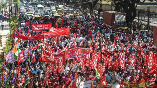 Bengaluru: Factory workers and members of Centre of Indian Trade Unions (CITU) raise slogans during a 48-hour-long nationwide general strike called by central trade unions in protest against the "anti-people" policies of the Centre, in Bengaluru, Tuesday, Jan 8, 2019. (PTI Photo/Shailendra Bhojak) (PTI1_8_2019_000201B)(PTI)