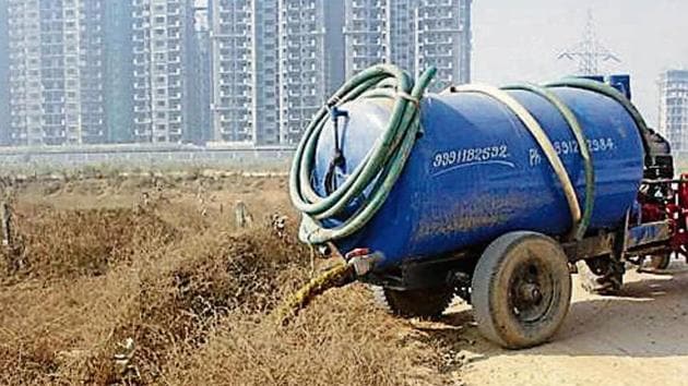 A private septic tank discharges untreated sewage in the open at Sector 68 near Badshahpur.