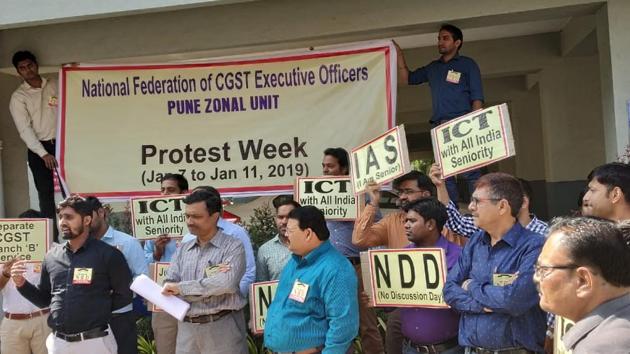 The officers are not only tasked with GST work but also handle legacy issues in addition to audit and investigation. Besides this, the officers are also seeking appointment in Inspector cadre based on seniority basis across India. (HT PHOTO) The officers are not only tasked with GST work but also handle legacy issues in addition to audit and investigation. Besides this, the officers are also seeking appointment in Inspector cadre based on seniority basis across India. (HT PHOTO)