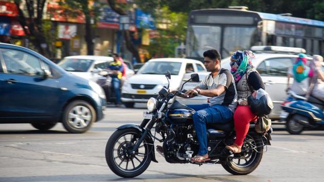 The traffic branch of Pune city police on Tuesday issued e-challan to a youth for riding without helmet in Kalyaninagar after his photo was posted on Facebook by a woman, with whom he had arguments while driving on a footpath on Monday (PICTURE FOR REPRESENTATIONAL PURPOSES ONLY) The traffic branch of Pune city police on Tuesday issued e-challan to a youth for riding without helmet in Kalyaninagar after his photo was posted on Facebook by a woman, with whom he had arguments while driving on a footpath on Monday (PICTURE FOR REPRESENTATIONAL PURPOSES ONLY)