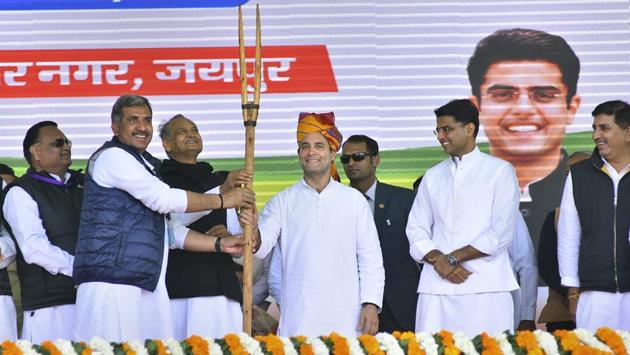 Congress President Rahul Gandhi is presented a memento during a farmers’ rally at Vidyadhar Nagar ground, in Jaipur. Gandhi criticised Prime Minister Narendra Modi for not doing enough for the farmers. “The PM always plays on the back foot, I want the youth of the country to play of front foot and hit a sixer,” he said during the rally. (PTI)