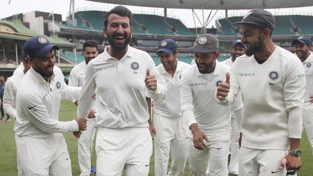 India's Virhat Kohli, right, encourages Cheteshwar Pujara, center, as the team dance as they celebrate their series win over Australia after play was called off on day 5 of their cricket test match in Sydney. (AP) India's Virhat Kohli, right, encourages Cheteshwar Pujara, center, as the team dance as they celebrate their series win over Australia after play was called off on day 5 of their cricket test match in Sydney. (AP)
