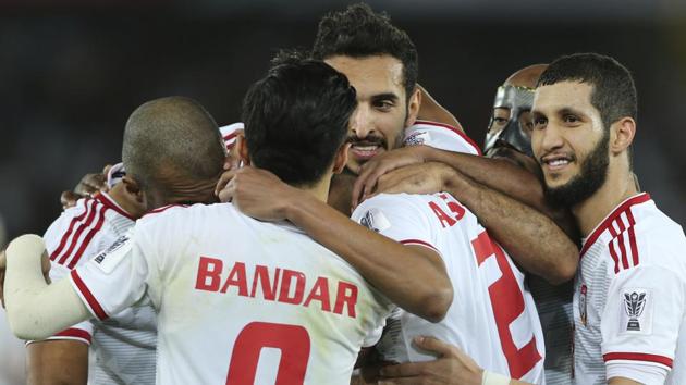 United Arab Emirates' forward Ali Mabkhout al Hajeri, center, celebrates with his teammates after scoring his side's second goal during the AFC Asian Cup.(AP)