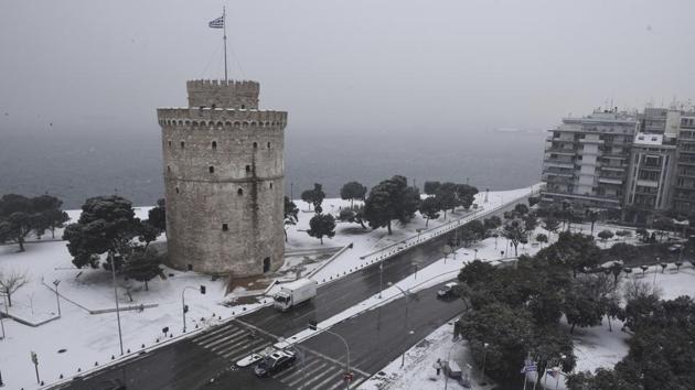 A panoramic view with the White Tower after snowfall in Thessaloniki. Ice in some northern suburbs turned roads inaccessible, and authorities used gritters to facilitate traffic. Snow has also disrupted some railway and bus service. (Giannis Papanikos / AP) A panoramic view with the White Tower after snowfall in Thessaloniki. Ice in some northern suburbs turned roads inaccessible, and authorities used gritters to facilitate traffic. Snow has also disrupted some railway and bus service. (Giannis Papanikos / AP)