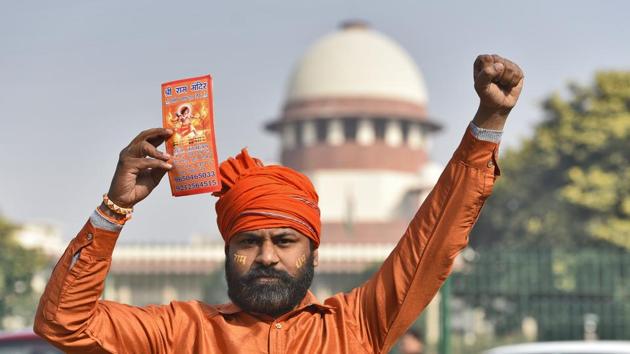 A Hindu group member protests to demand the construction of the Ram Temple, near Supreme Court in Delhi. Justice UU Lalit, one of the five judges of the Supreme Court constitution bench hearing the Ayodhya case, offered to opt out after a lawyer pointed out that he had represented one of the parties nearly two decades ago. The Supreme Court will now hear the case on January 29. (Burhaan Kinu / HT Photo) A Hindu group member protests to demand the construction of the Ram Temple, near Supreme Court in Delhi. Justice UU Lalit, one of the five judges of the Supreme Court constitution bench hearing the Ayodhya case, offered to opt out after a lawyer pointed out that he had represented one of the parties nearly two decades ago. The Supreme Court will now hear the case on January 29. (Burhaan Kinu / HT Photo)