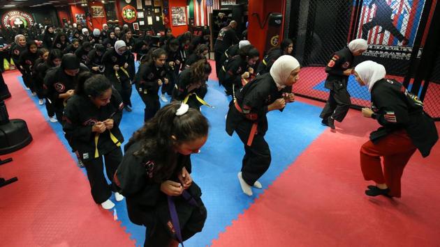 More than 120 girls and women between the ages of four and 50 participate in the academy’s different kajukenbo classes, which are held in a room with training weapons lining its walls. Some 40 men and boys also currently take part in kajukenbo classes at the club on different days from the women. (Yasser Al-Zayyat / AFP) More than 120 girls and women between the ages of four and 50 participate in the academy’s different kajukenbo classes, which are held in a room with training weapons lining its walls. Some 40 men and boys also currently take part in kajukenbo classes at the club on different days from the women. (Yasser Al-Zayyat / AFP)