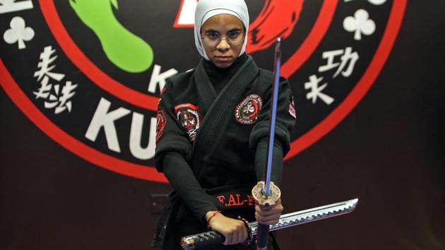The academy, which has a strict confidentiality policy, has become a safe haven for many girls and women. It is one of dozens of similar clubs and academies in Kuwait as kajukenbo gains popularity. In the rest of the Gulf, the sport remains relatively unknown. “Ultimately, girls are embracing this kind of martial art and we see it boosting their self-confidence,” said Fai al-Fahed, one of the instructors. (Yasser Al-Zayyat / AFP) The academy, which has a strict confidentiality policy, has become a safe haven for many girls and women. It is one of dozens of similar clubs and academies in Kuwait as kajukenbo gains popularity. In the rest of the Gulf, the sport remains relatively unknown. “Ultimately, girls are embracing this kind of martial art and we see it boosting their self-confidence,” said Fai al-Fahed, one of the instructors. (Yasser Al-Zayyat / AFP)