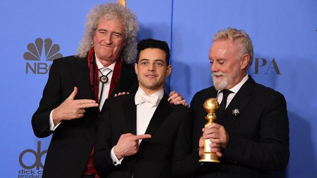 Best Actor in a Motion Picture – Drama for “Bohemian Rhapsody” winner Rami Malek poses with Queen band members Roger Taylor (R) and Brian May (L) during the 76th annual Golden Globe Awards, at the Beverly Hilton hotel in Beverly Hills, California. (Mark Ralston / AFP) Best Actor in a Motion Picture – Drama for “Bohemian Rhapsody” winner Rami Malek poses with Queen band members Roger Taylor (R) and Brian May (L) during the 76th annual Golden Globe Awards, at the Beverly Hilton hotel in Beverly Hills, California. (Mark Ralston / AFP)