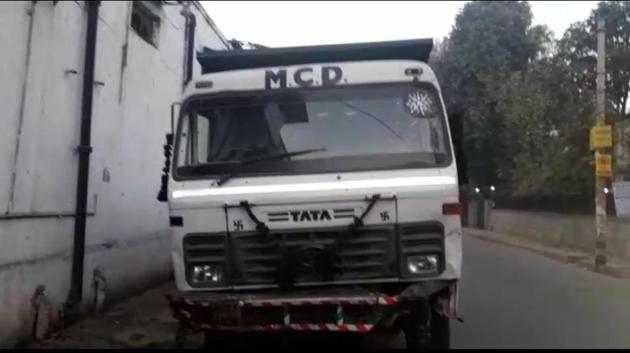 Police said the accused, who was driving the garbage dumper, was working for a firm outsourced by the North Delhi Municipal Council to collect and dump garbage. (HT Photo) Police said the accused, who was driving the garbage dumper, was working for a firm outsourced by the North Delhi Municipal Council to collect and dump garbage. (HT Photo)