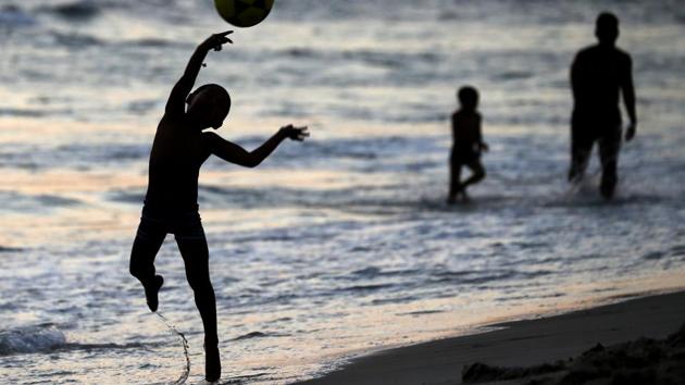 A boy plays on Barra da Tijuca beach in Rio de Janeiro, Brazil. (Sergio Moraes / REUTERS) A boy plays on Barra da Tijuca beach in Rio de Janeiro, Brazil. (Sergio Moraes / REUTERS)