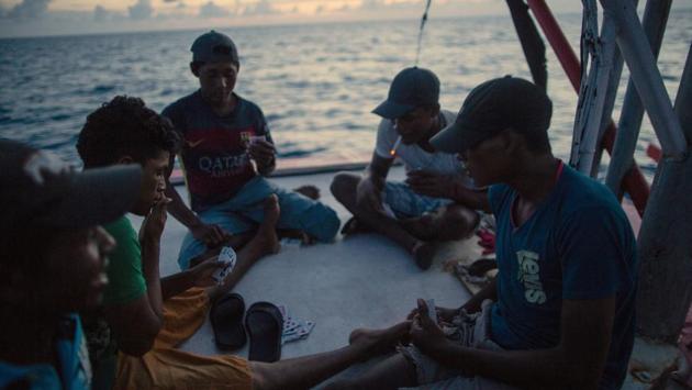 Many divers go deep, surface quickly and then return for more, racing to collect as much lobster as possible. The boats, where they spend days playing cards and talking among themselves between dives, often have only rudimentary safety equipment. Just how many have been stricken is somewhat unclear, though all agree it’s a large number for such small communities. (Rodrigo Abd / AP) Many divers go deep, surface quickly and then return for more, racing to collect as much lobster as possible. The boats, where they spend days playing cards and talking among themselves between dives, often have only rudimentary safety equipment. Just how many have been stricken is somewhat unclear, though all agree it’s a large number for such small communities. (Rodrigo Abd / AP)