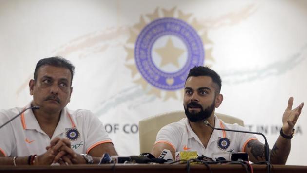 File picture of Virat Kohli and Ravi Shastri (AP) File picture of Virat Kohli and Ravi Shastri (AP)
