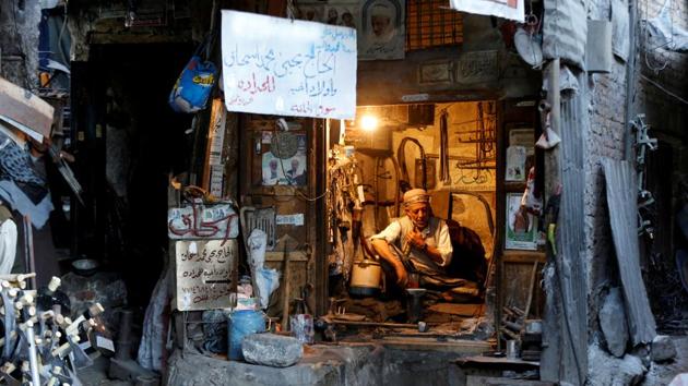 A blacksmith sits in his shop at the Souq al-Melh market in the old quarter of Sanaa, Yemen. (Khaled Abdullah / REUTERS) A blacksmith sits in his shop at the Souq al-Melh market in the old quarter of Sanaa, Yemen. (Khaled Abdullah / REUTERS)