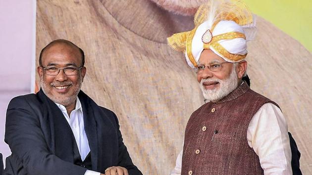 Imphal: Prime Minister Narendra Modi shakes hands with Manipur Chief Minister N Biren Singh during the launch of development projects, in Imphal, Friday, Jan 4, 2019. (PTI Photo) (PTI1_4_2019_000175B)(PTI) Imphal: Prime Minister Narendra Modi shakes hands with Manipur Chief Minister N Biren Singh during the launch of development projects, in Imphal, Friday, Jan 4, 2019. (PTI Photo) (PTI1_4_2019_000175B)(PTI)