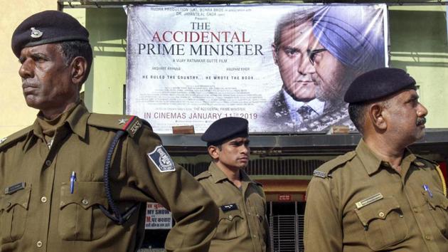 Police personnel keep vigil on the first day of screening of 'The Accidental Prime Minister' in Bhopal on Friday.(PTI)