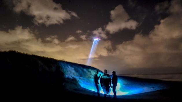 French gendarmes patrol while a police helicopter flies over the beach of Oye-Plage, near Calais, France as they try to intercept migrants attempting to cross the Channel. (Philippe Huguen / AFP) French gendarmes patrol while a police helicopter flies over the beach of Oye-Plage, near Calais, France as they try to intercept migrants attempting to cross the Channel. (Philippe Huguen / AFP)