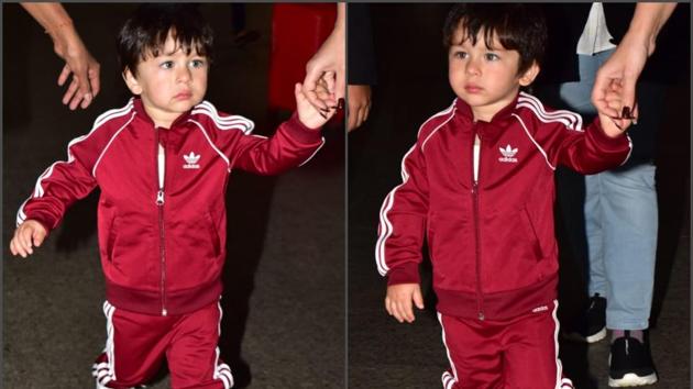 Taimur Ali Khan at the airport in a maroon tracksuit(Viral Bhayani)