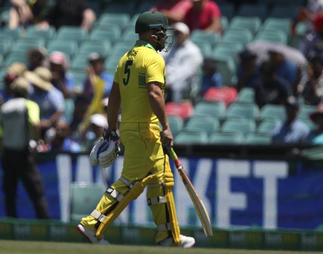 Australia's Aaron Finch walks off after he was bowled by India during their one day international cricket match in Sydney. (AP)