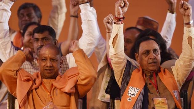 Uttar Pradesh CM Yogi Adityanath along with Gujarat CM Vijay Rupani at the BJP national executive meet in New Delhi.(Raj K Raj/HT Photo)