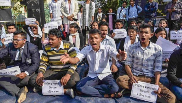 Guwahati: Guwahati Commerce College students stage a protest and raise slogans against Citizenship (Amendment) Bill, in Guwahati, Friday, Jan 11, 2019. (PTI Photo) (PTI1_11_2019_000064A) (PTI) Guwahati: Guwahati Commerce College students stage a protest and raise slogans against Citizenship (Amendment) Bill, in Guwahati, Friday, Jan 11, 2019. (PTI Photo) (PTI1_11_2019_000064A) (PTI)