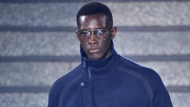 A model presents a creation for fashion house Ermenegildo Zegna during the Men's Fall/Winter 2019/20 fashion shows in Milan, on January 11, 2019. (Photo by Andreas SOLARO / AFP) (AFP)