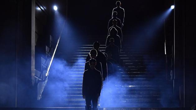 Models present creations for fashion house Ermenegildo Zegna during the Men's Fall/Winter 2019/20 fashion shows in Milan, on January 11, 2019. (Photo by Andreas SOLARO / AFP) (AFP)